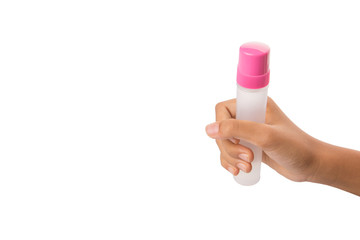 Female teenage hand holding colorful glue bottles 