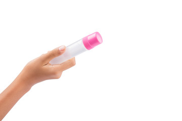 Female teenage hand holding colorful glue bottles 