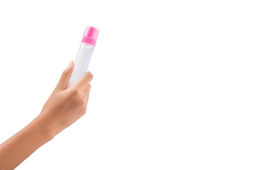 Female teenage hand holding colorful glue bottles 