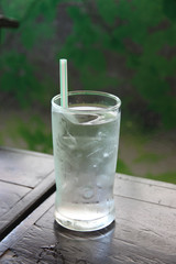 The glass on wood table.