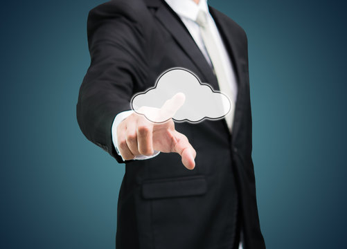 Businessman hand pressing cloud icon on concept for cloud comput