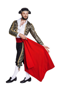 Male dressed as matador on a white background