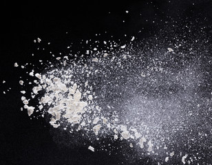 launched colorful powder over black