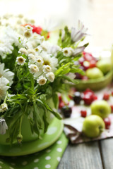 Still life with berries and flowers