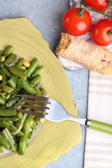 Salad with green beans and corn,