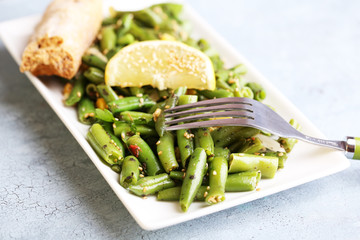 Salad with green beans and corn, sesame seeds