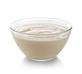Obraz na płótnie Canvas Glass bowl of yogurt isolated on white