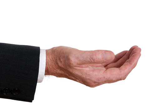 Senior businessman hand outstretched - asking or offering. White
