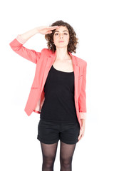 Beautiful Hispanic woman doing different expressions in different sets of clothes: at attention