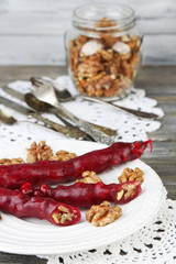 Tasty oriental sweets (churchkhela) and fresh nuts,