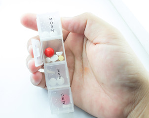 Medicine in pill box.