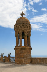 Bell tower on top of Tibidabo mountain, Barcelona, Spain