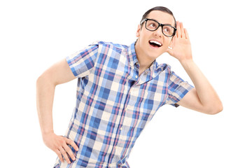 Young man trying to hear something