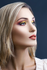Portrait of fashion woman with a bright make-up