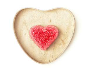 Heart shaped candy in wooden heart box