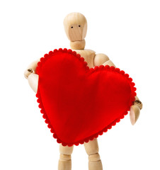 Wooden puppet with a paper heart