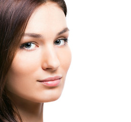 Portrait of young beautiful woman with perfect skin