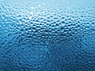 natural water drops on glass