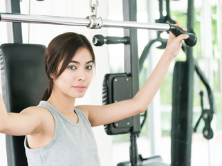 Fototapeta premium Woman workout at fitness