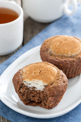 chocolate cakes with cheese filling and cup of tea