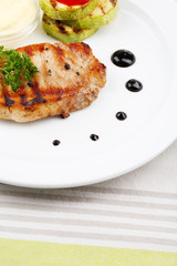 Grilled steak  on plate, close up