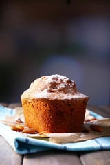 Tasty cake on table on dark background