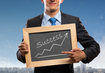 Businessman with frame