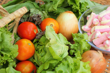 Vegetables salad, tomato and pink marshmallows.