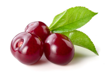 Fototapeta na wymiar Cherry. Three berries isolated on white