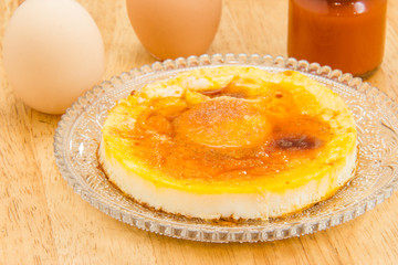 fried egg with tomato Sauce on crystal dish