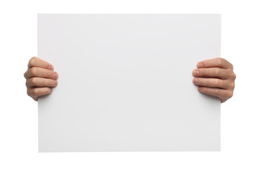 Male hands holding blank paper isolated on white background - obrazy, fototapety, plakaty