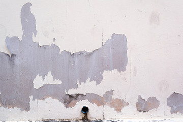 wall and pipe and peel of painted