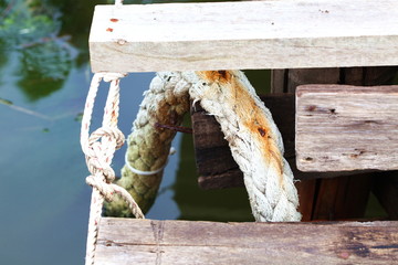 Fototapeta premium rope tie knot of old and vintage wooden bridge