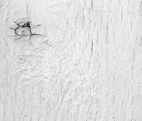 Weathered wood with a white enamel.