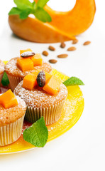 Tasty pumpkin muffins, isolated on white