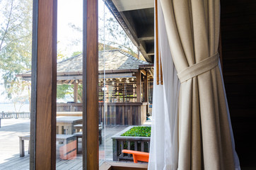 Rear view of glass windows at sea view resort.