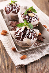 Tasty cupcakes on table close-up