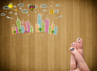 Happy smiley fingers looking at colorful handrawn cityscape