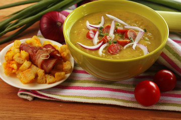 Leek soup on table, close up