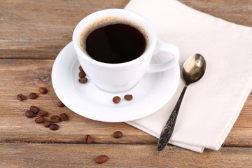 Cup of coffee on wooden background