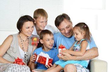 Friendly family with gifts