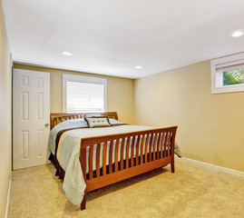 Cozy bedroom interior in soft ivory color