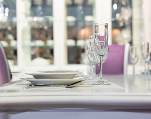 Served fashion table in white colors