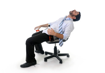 drunk businessman sleeping wasted at office chair