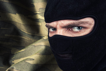 Serious man in a balaclava mask