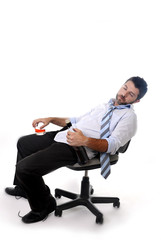 drunk businessman sleeping wasted in office chair