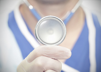 Doctor holding a stethoscope. Close-up photo