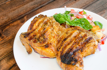 Chicken under a brick with panzanella salad