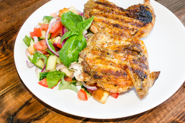 Chicken under a brick with panzanella salad