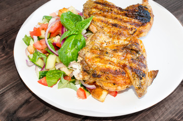 Chicken under a brick with panzanella salad